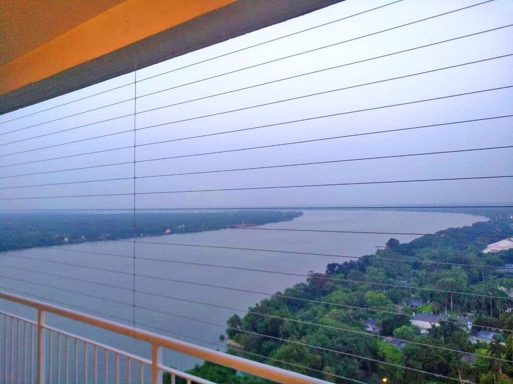 Invisible grill installation detail on a balcony